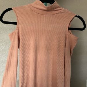 Light pink turtle neck top with open shoulders